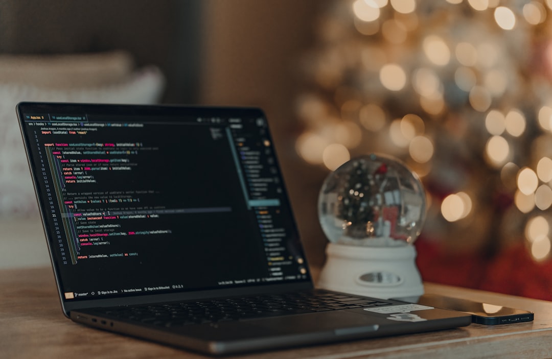 developer working on code with Christmas lights