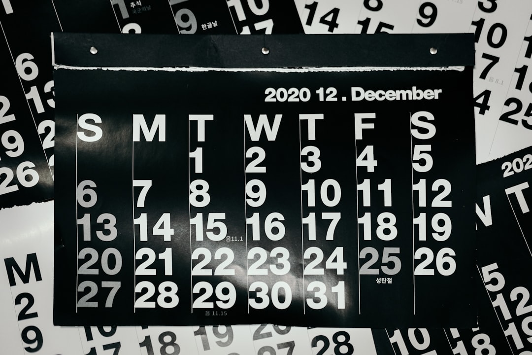 A calendar with code snippets replacing dates, highlighting December 1-12