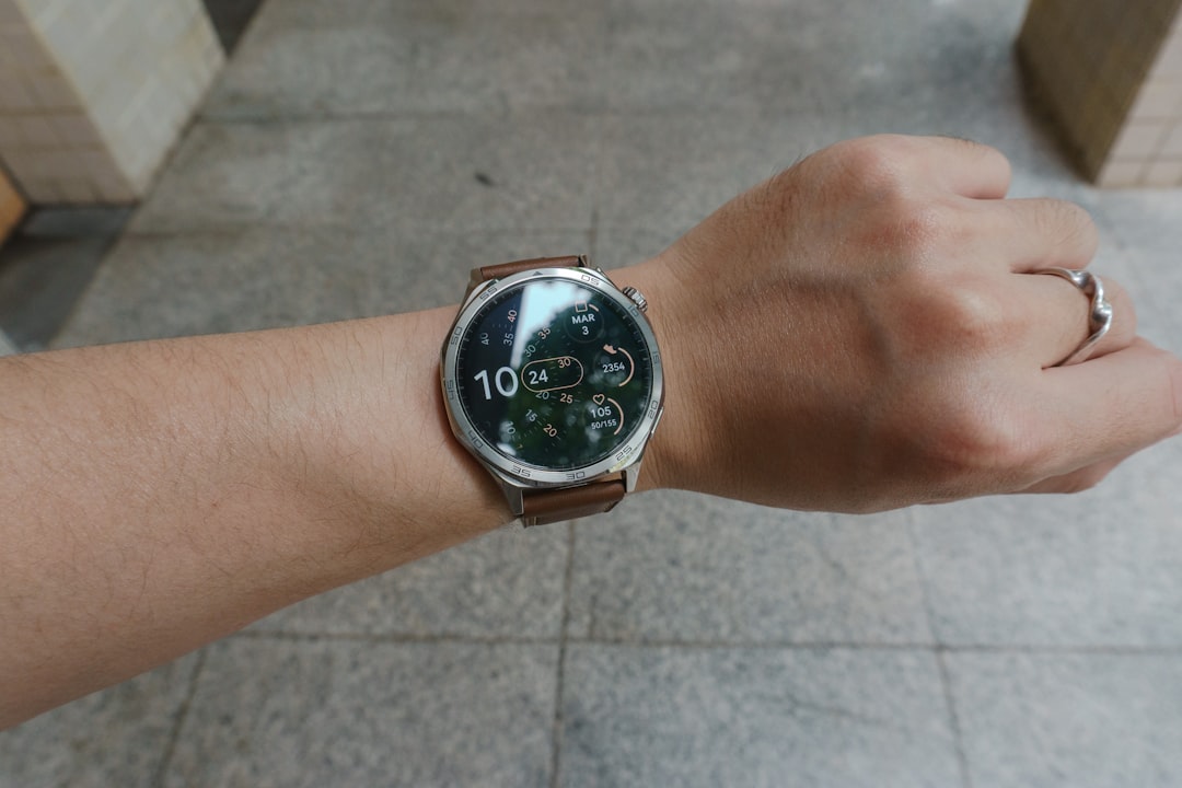 A modern smartwatch displaying code on its screen, symbolizing open source software